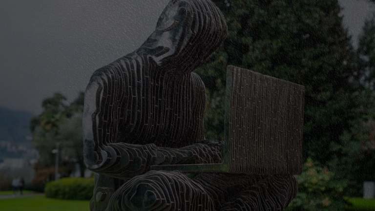 Satoshi Nakamoto Statue Pulled From Lake Lugano After Vandalism Incident - EGamers.io - P2E NFT Games Portal